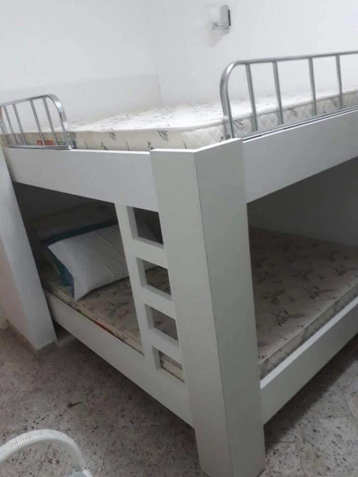 Quarto planejado com escrivaninha integrada
